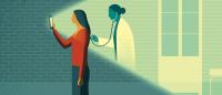 person looks at phone while nurse puts stethoscope to back.